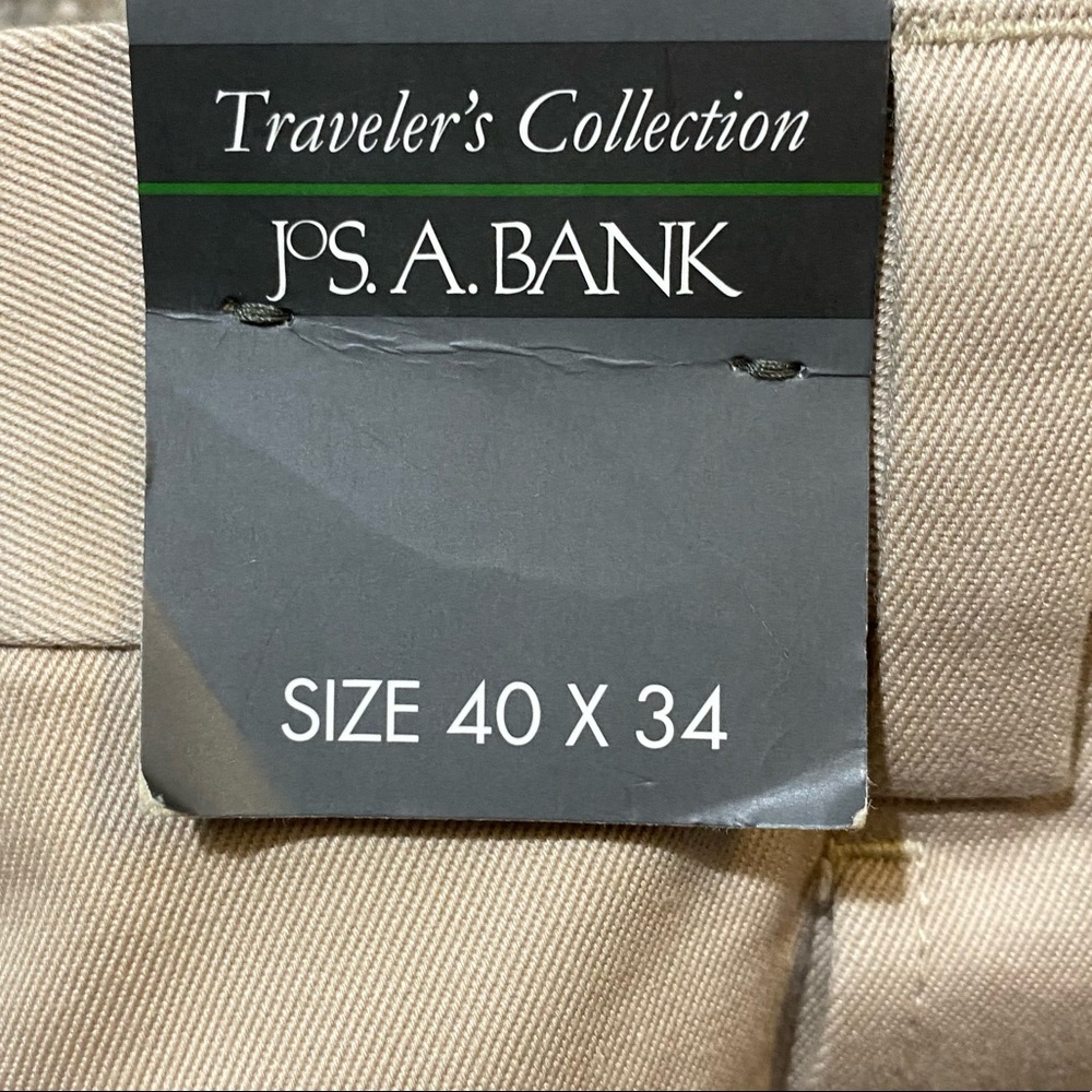 🔥! Jos. robbin🦹‍♂️A Bank NWT Traveler’s Collection Pleated Cream Khakis 40x34